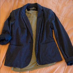 The limited navy blue polka dotted blazer